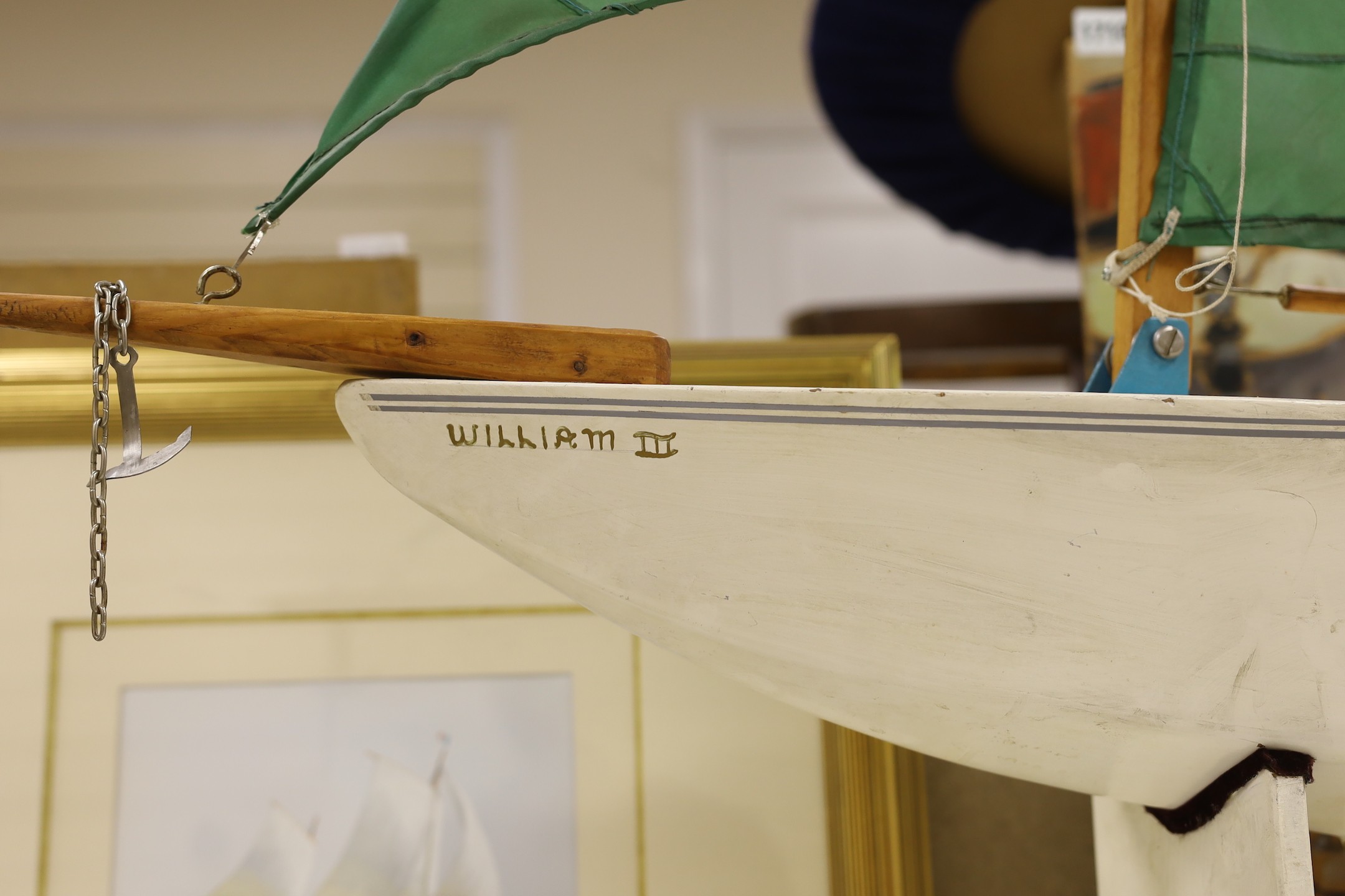 A pond yacht with stand, 100cms wide x 100cms high.